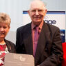 Ian Gylee from Dragonsavers receives a lifetime achievement award from Jane Hutt AM, patron of Credit Unions of Wales, and BBC broadcaster Jennifer Jones