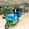 Jo Whitfield, Food CEO at the Co-op Group, with one of the new Home Delivery Bikes at the Chelsea store (Image: Joel Chant)