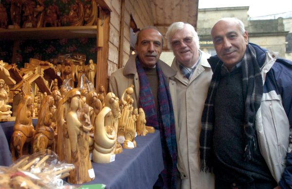 Edgar helped bring the Holy Land Handicraft Cooperative to Bath Christmas Market. From left: Jamal Salameh (director, Holy Land Handicraft), Edgar Evans and Johnny Hilel (Bath Co-op Board Member) Pictures Clare Green